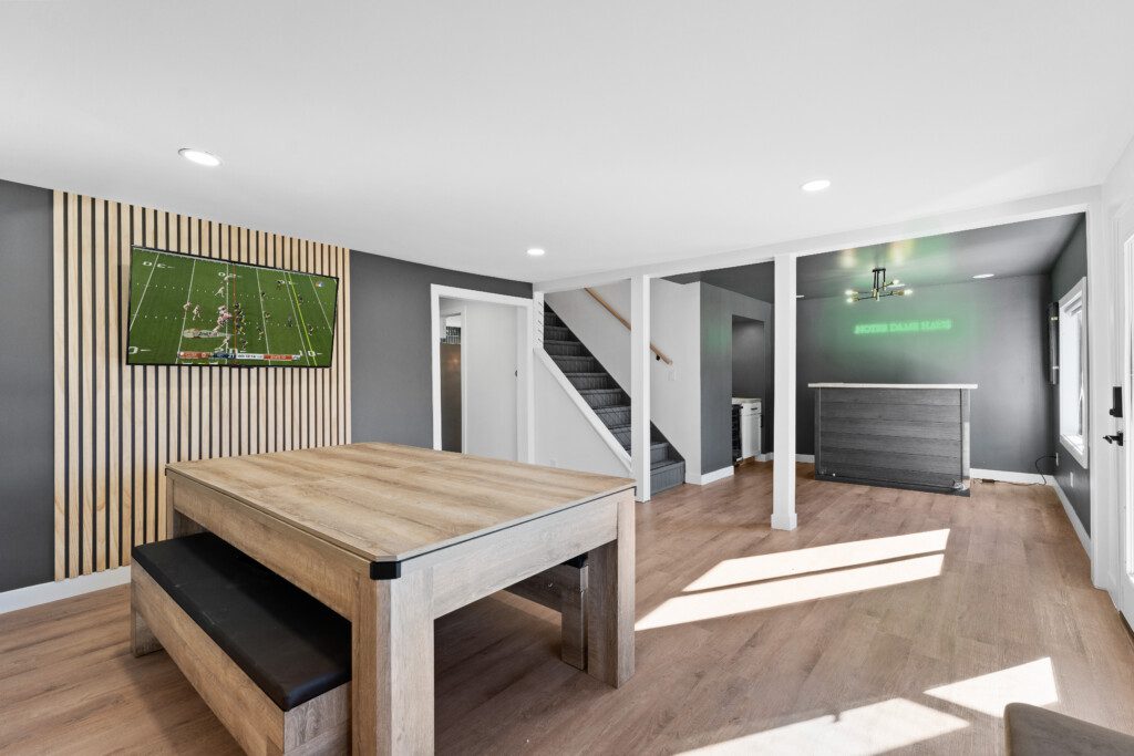 Why go out when the fun is all here? 🎱🏓📺 Notre Dame Pool Haus game room has ping pong, pool, & the big game on TV. Perfect for family nights or rainy-day fun!