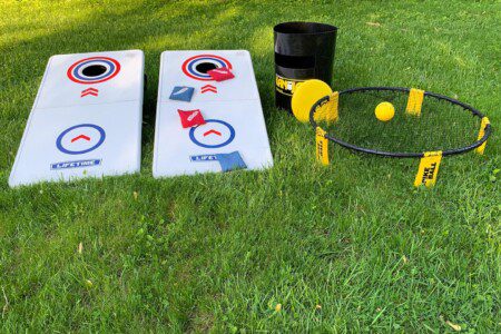 Backyard Oasis -  backyard games: 1) Spikeball 2) Kan Jam 3) Corn Hole
