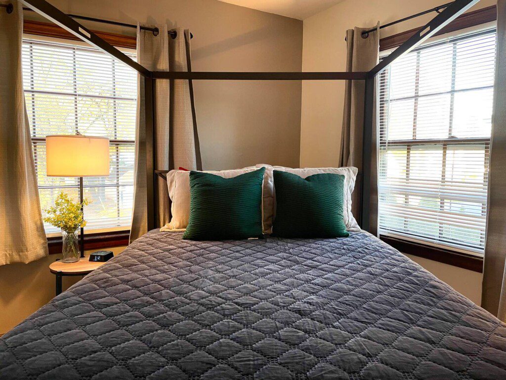 Upstairs Bedroom #2 - with highly rated Lucid queen mattress; a clock w/ USB and outlets to make charging devices super convenient; 43" Roku Smart TV;