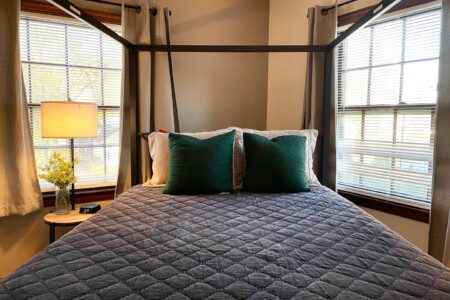 Upstairs Bedroom #2 - with highly rated Lucid queen mattress; a clock w/ USB and outlets to make charging devices super convenient; 43" Roku Smart TV;