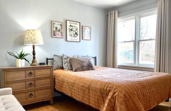 Bedroom #1 with queen bed; nightstand a clock w/ USB and outlets to make charging devices super convenient