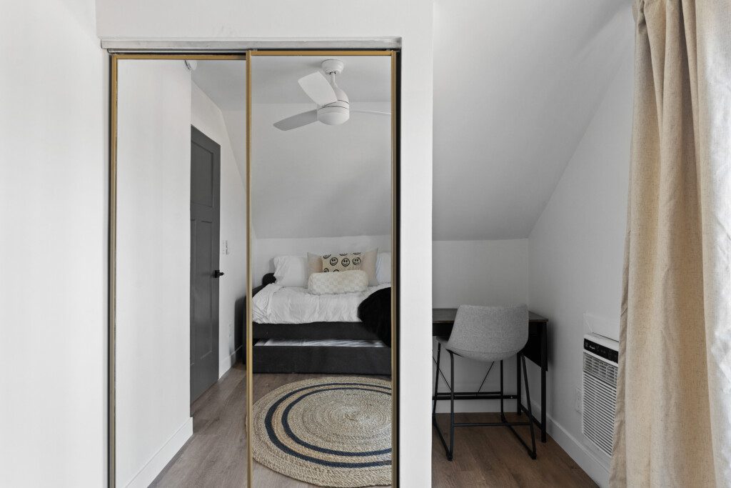 This cozy upstairs bedroom features a twin trundle bed with two twin mattresses—perfect for kids, friends, or extra guests. Please note: this room sleeps two guests total.