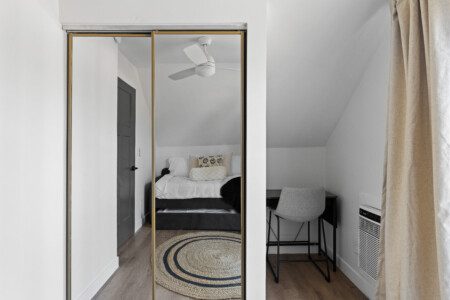 This cozy upstairs bedroom features a twin trundle bed with two twin mattresses—perfect for kids, friends, or extra guests. Please note: this room sleeps two guests total.