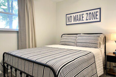 The Waldron Lake Retreat Bedroom #2: 
✔ Queen Bed with Pillows, Linens, and Sheets
✔ Touch Reading Lamps with USB plug-ins