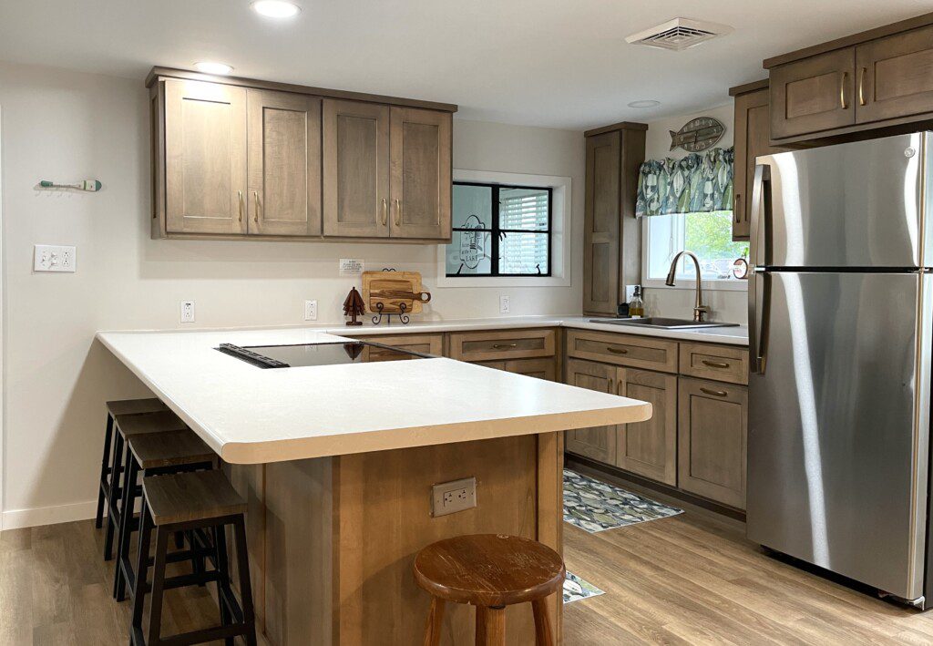 Stone Lake Cottage Retreat: Everything you need without the clutter — plus a peninsula bar for extra seating and easy conversation.