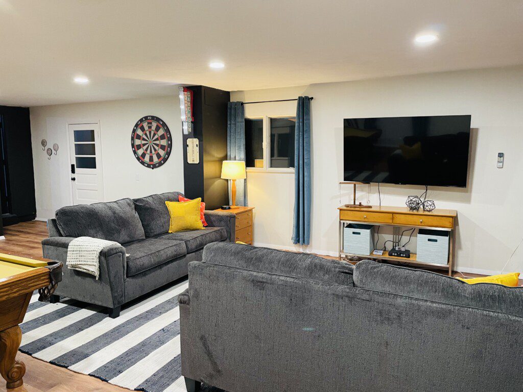 🎯 The Ultimate Game Room! 🎮
Play pool, battle on the digital game board, hit the giant dart board & Connect Four, enjoy retro gaming, or stream on the 65" Roku TV — plus cozy queen Murphy beds & sofas (sleeps 8). Endless fun for everyone!