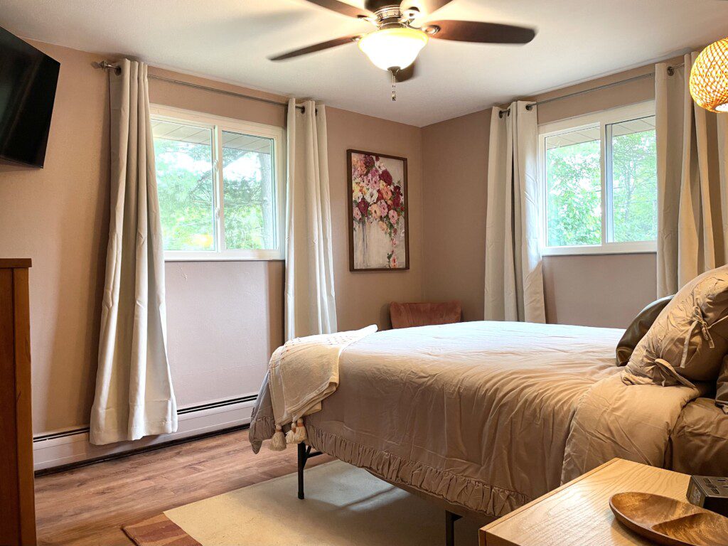 Bedroom #3 with highly rated Lucid queen mattress; a clock w/ USB and outlets to make charging devices super convenient; Reading Lights; 43" Roku Smart TV