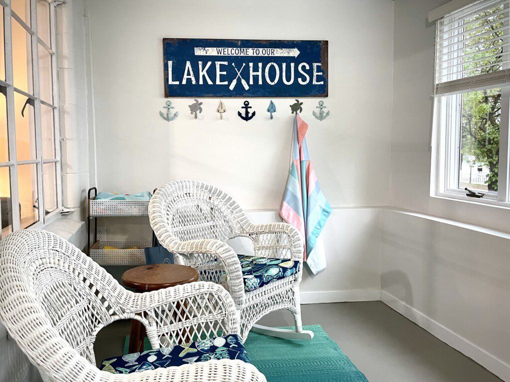 Stone Lake Cottage Retreat: Grab a seat, sip something warm, and soak in the lake view from the entry sitting room.