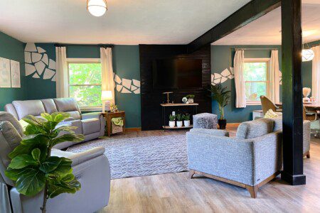 Open Concept for Gatherings! The open-concept living room at Riverside Paradise is perfect for connecting. Kids can play, families can dine, and everyone can enjoy movies on the 65" Fire TV. Custom wall art adds a unique touch to this spacious haven