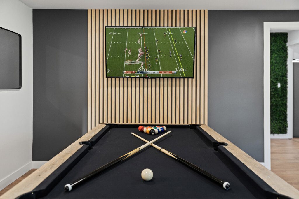 Why go out when the fun is all here? 🎱🏓📺 Notre Dame Pool Haus game room has ping pong, pool, & the big game on TV. Perfect for family nights or rainy-day fun!