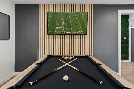 Why go out when the fun is all here? 🎱🏓📺 Notre Dame Pool Haus game room has ping pong, pool, & the big game on TV. Perfect for family nights or rainy-day fun!