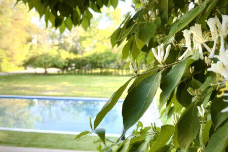 Family Fun at Riverside Pool Paradise! Splash in the pool, relax in the hot tub, or enjoy yard games. Spacious deck with seating! Toddler cabana, & custom art.