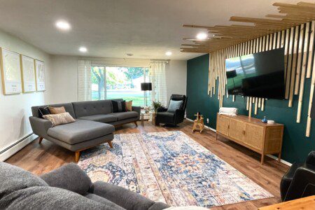 The Unmatched Living Room - Custom Wall Art!! 65" Roku TV with YouTube TV access provided. Enjoy the comfortable and unique sofa options