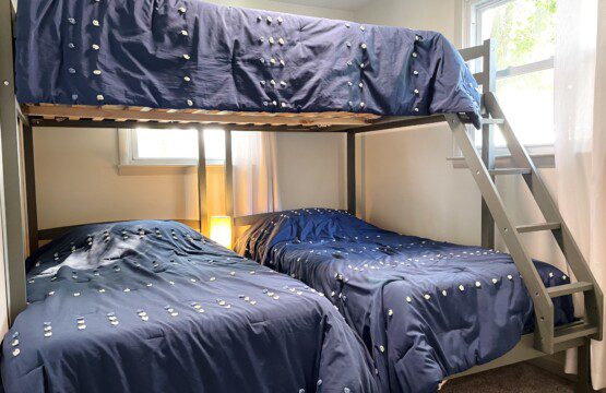 The Waldron Lake Retreat Bedroom #4: 
✔ Double bed with Pillows, Linens, and Sheets on top
✔ Two twin beds with Pillows, Linens, and Sheets on bottom
✔ Touch Reading Lamps with USB plug-ins