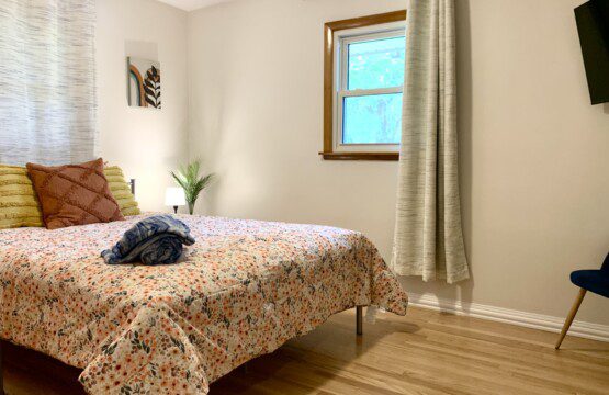 Bedroom #2 - queen bed, 43" Roku Smart TV; reading lamps with USB plug-in