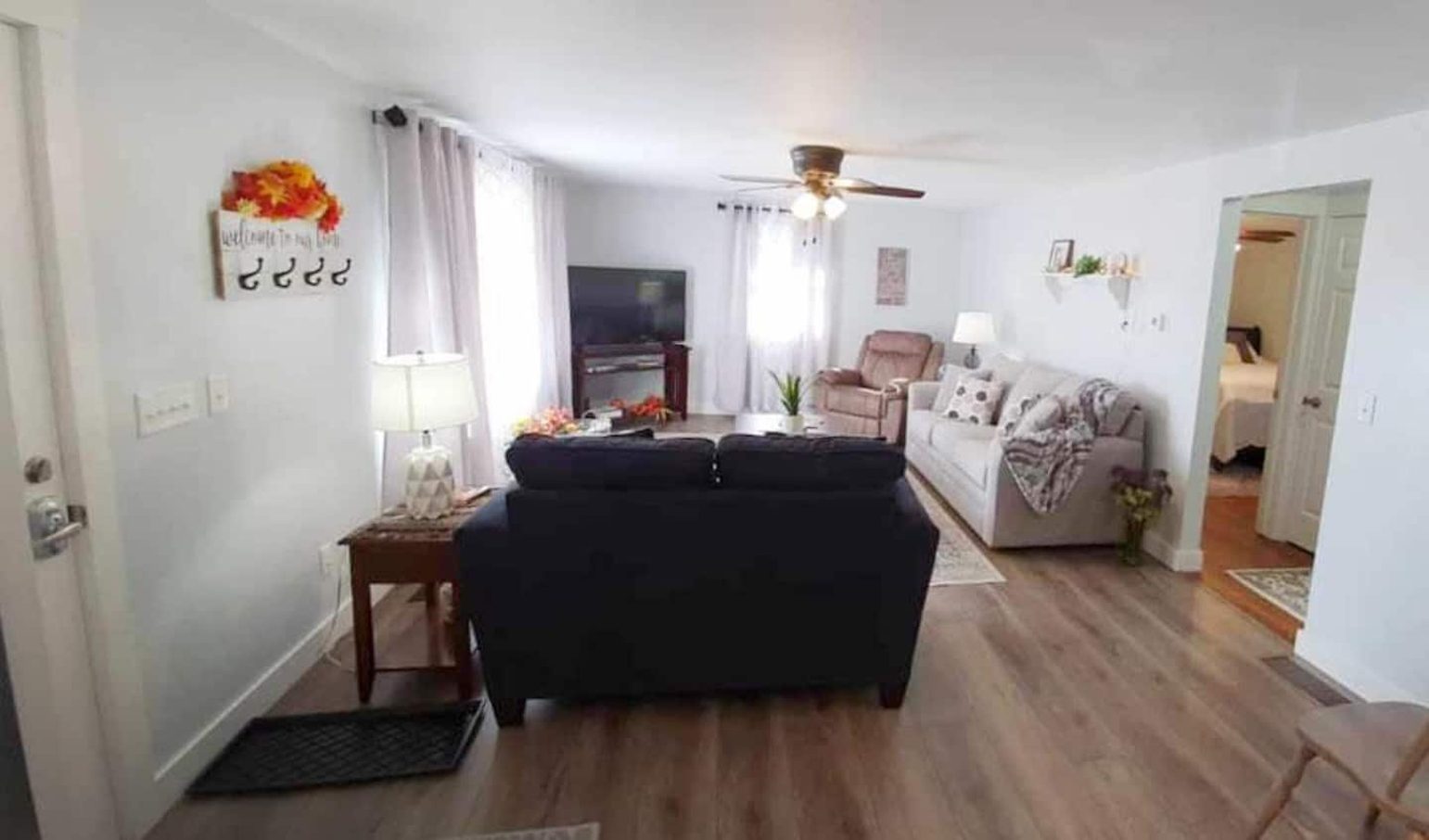 Living Room with 55" Samsung SmartTV with complimentary YouTubeTV access (sleeper sofa can sleep two people).