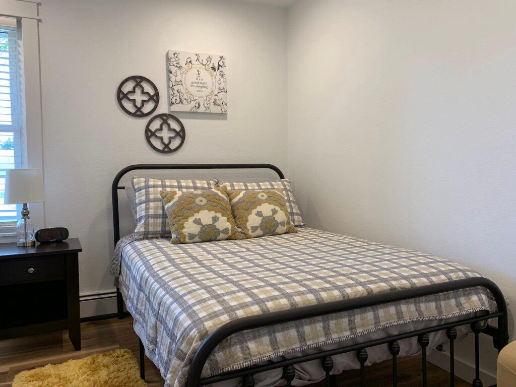 Bedroom #3 - comfortable full bed; USB clock right beside the bed for all your charging needs