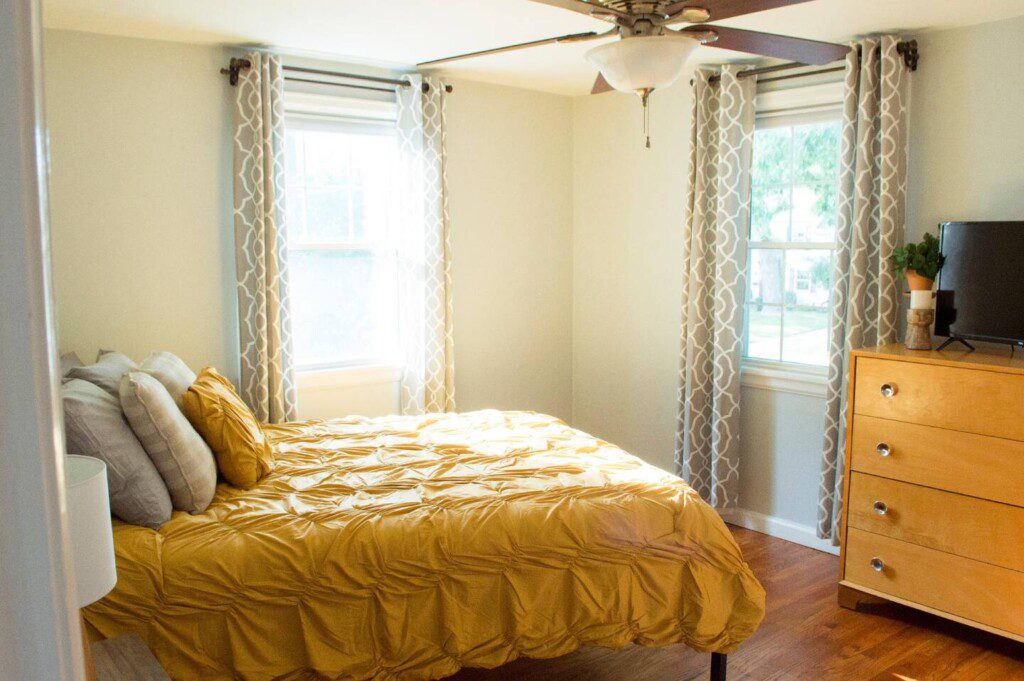 Bedroom #1 with highly rated Lucid queen mattress; 32 Inch Roku TV with YouTubeTV access; nightstand a clock w/ USB and outlets to make charging devices super convenient