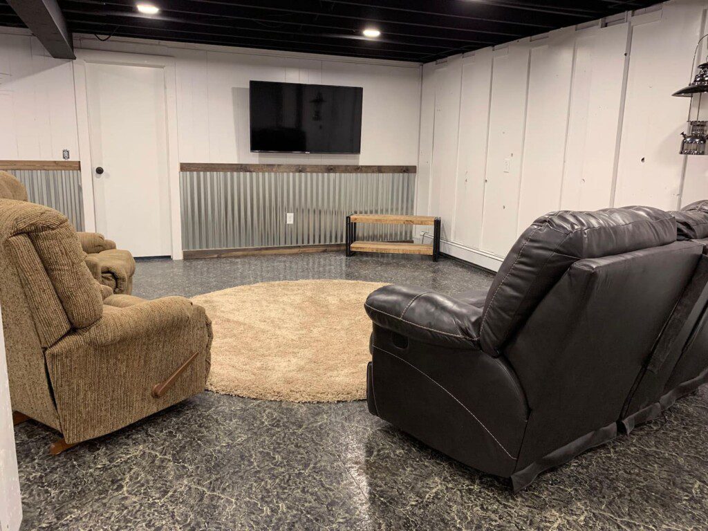 Finished basement! Try your hand at ping pong, compete on a small basketball hoop, or simply relax and watch TV on the 55" TCL Roku TV with complimentary YouTubeTV access.