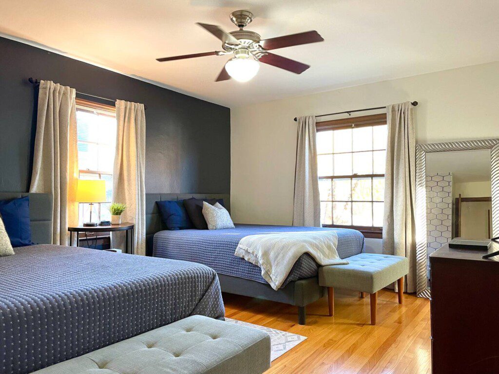 Upstairs Bedroom #1 - with highly rated Lucid queen mattress; a clock w/ USB and outlets to make charging devices super convenient; 43" Roku Smart TV