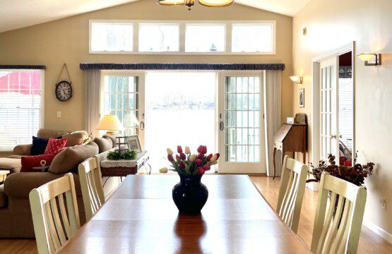 Enjoy family meals with a view—gather around the dining table and take in the picturesque lake views just outside.