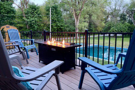Fireside Nights Under the Stars! Cozy up by the firepit table at Riverside Pool Paradise - perfect for stargazing evenings.