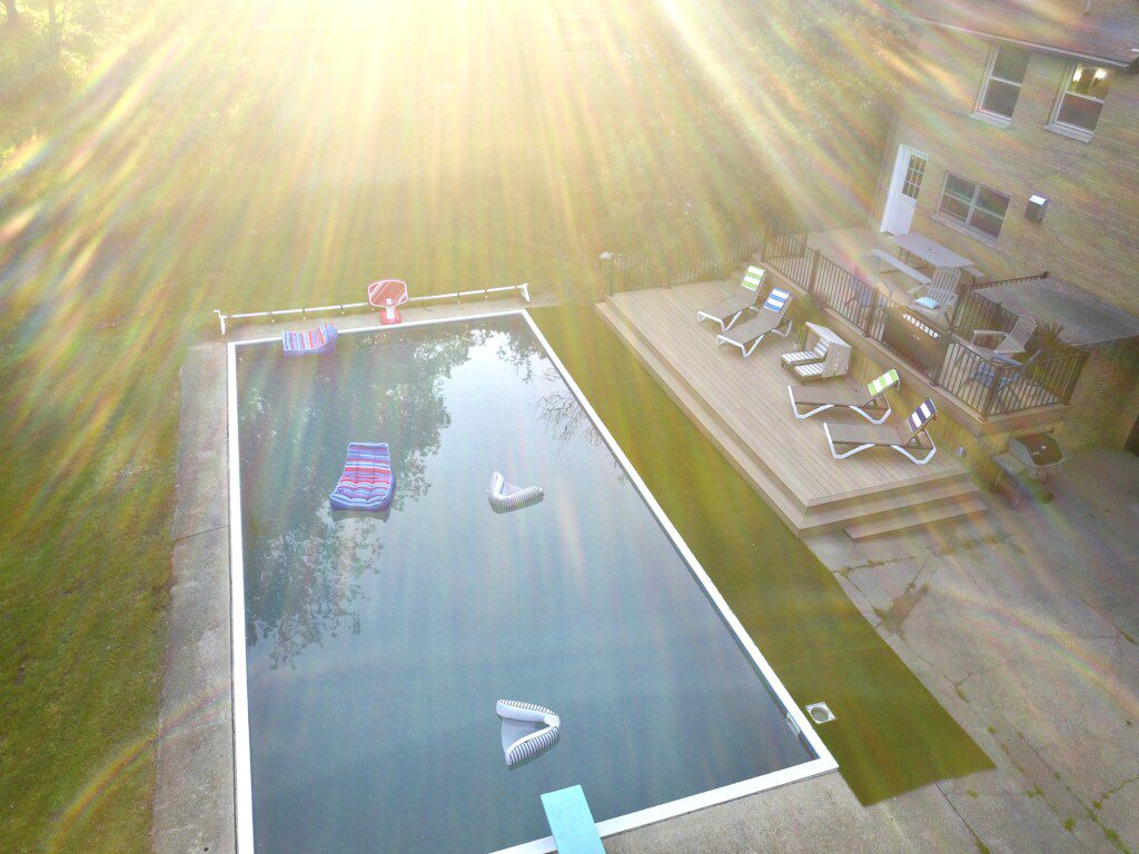 Family Fun at Riverside Pool Paradise! Splash in the pool, relax in the hot tub, or enjoy yard games. Spacious deck with seating! Toddler cabana, & custom art.