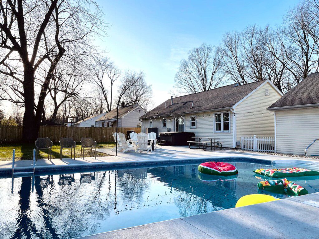 Enjoy the ultimate relaxation with poolside vibes, a soothing hot tub, and a cozy fire pit. Whether you're playing backyard games, grilling your favorite meal, or just lounging under the twinkling lights, this space is your perfect escape for a wonde