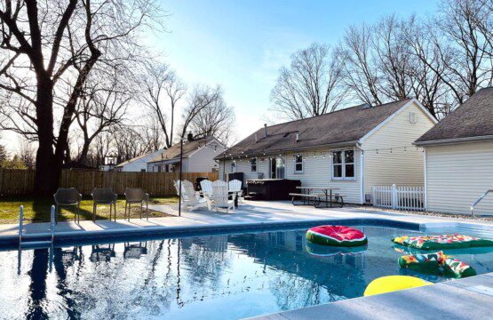 Enjoy the ultimate relaxation with poolside vibes, a soothing hot tub, and a cozy fire pit. Whether you're playing backyard games, grilling your favorite meal, or just lounging under the twinkling lights, this space is your perfect escape for a wonde