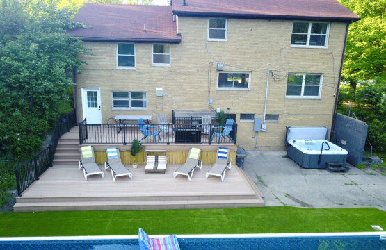 Family Fun at Riverside Pool Paradise! Splash in the pool, relax in the hot tub, or enjoy yard games. Spacious deck with seating! Toddler cabana, & custom art.