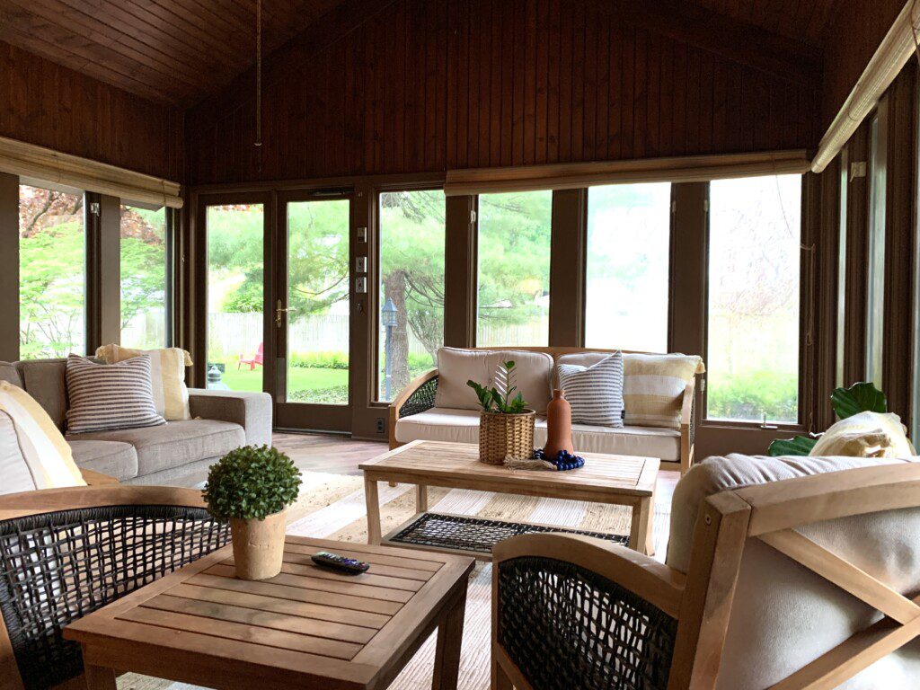 Four season sitting room - enjoy the beautiful landscaped property from the comfort of a sitting room, or enjoy a movie on the 50" Roku Smart TV