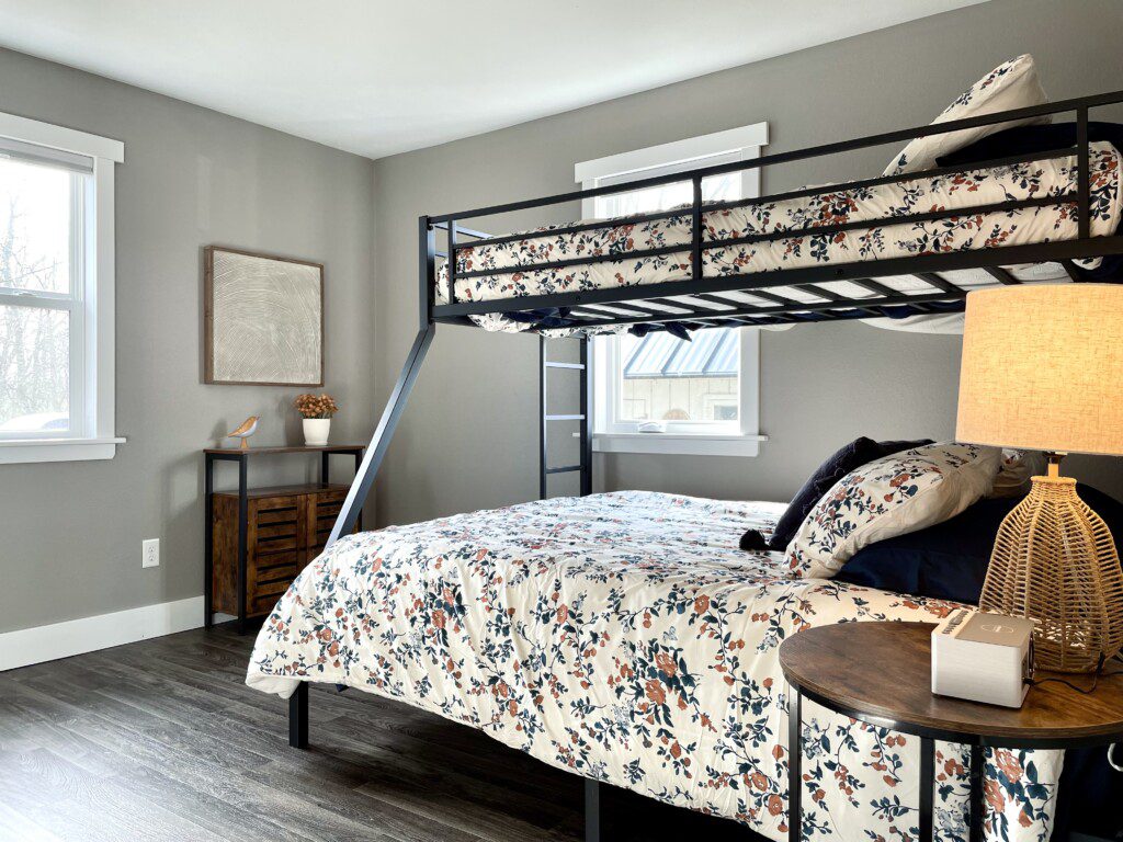 Bedroom #2 - queen bed with a twin bunk on top, charging alarm clocks