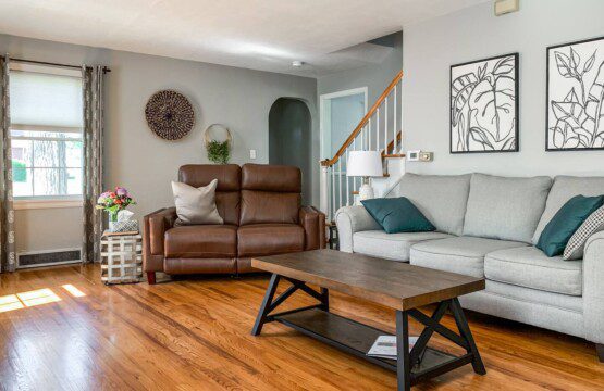 Living Room with 55" Roku TV with YouTube TV access. Very high quality power reclining love seats!!