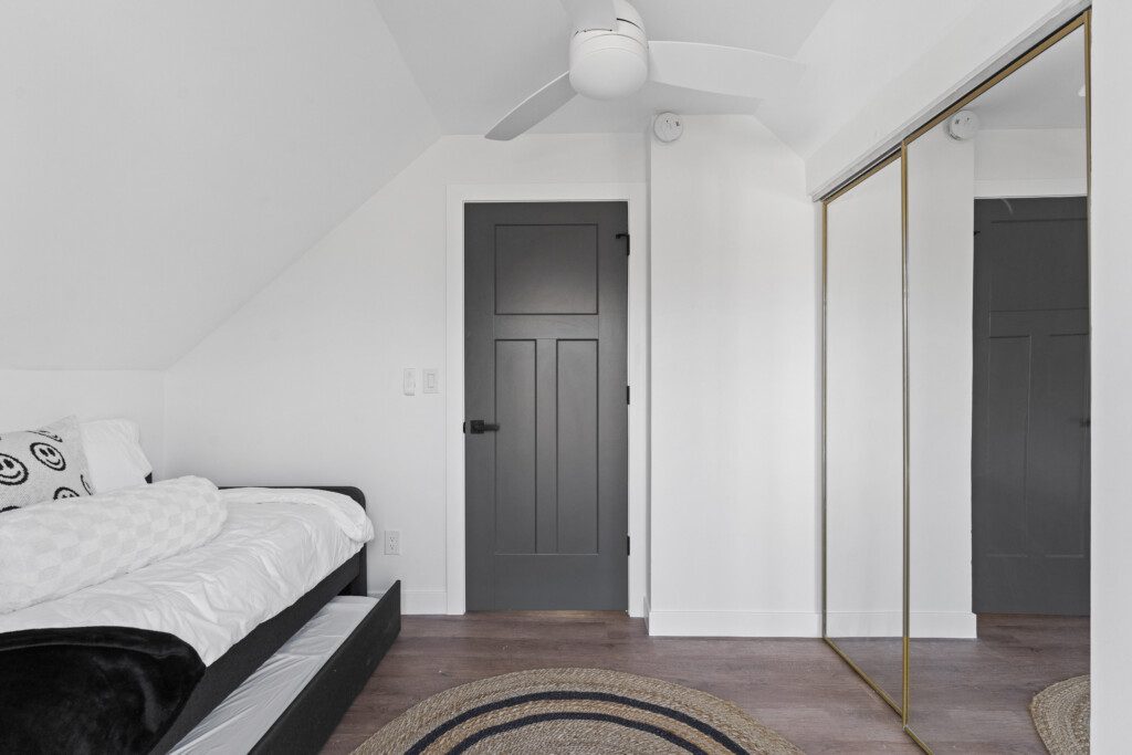 This cozy upstairs bedroom features a twin trundle bed with two twin mattresses—perfect for kids, friends, or extra guests. Please note: this room sleeps two guests total.