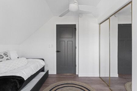 This cozy upstairs bedroom features a twin trundle bed with two twin mattresses—perfect for kids, friends, or extra guests. Please note: this room sleeps two guests total.