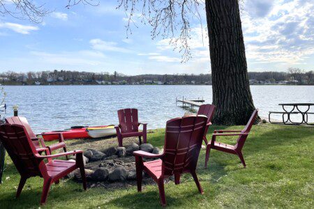 Paradise at Pier 124: Unwind by the fire pit with stunning lake views—perfect for cozy evenings with family and friends.