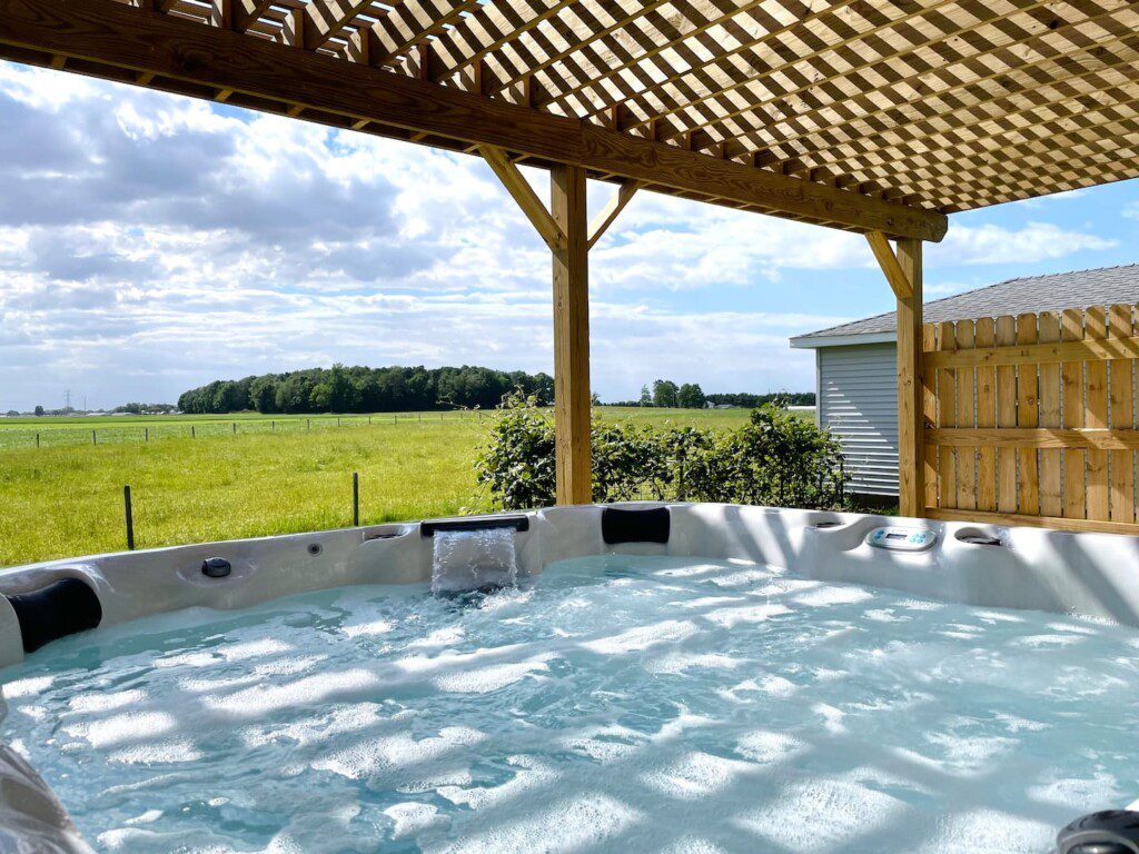 Relax the night away in our hot tub overlooking the peaceful surroundings of farm country!!