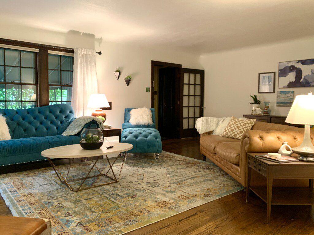 Living Room with 65" Roku TV with YouTube TV access provided. Enjoy the comfortable, unique, and retro sofa options