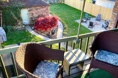 Upstairs back patio overlooking the backyard oasis!! Peaceful sitting area to escape!