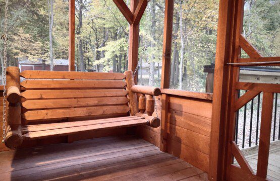 ✨ Imagine yourself here, relaxing on the porch swing in a screened-in oasis. Sway in comfort, surrounded by serene forest views—your peaceful retreat awaits!
