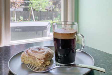 Can't you see yourself enjoying this nice cup of espresso?! Coffee bar; espresso maker; traditional coffee maker (coffee/espresso provided, cinnamon rolls are not)