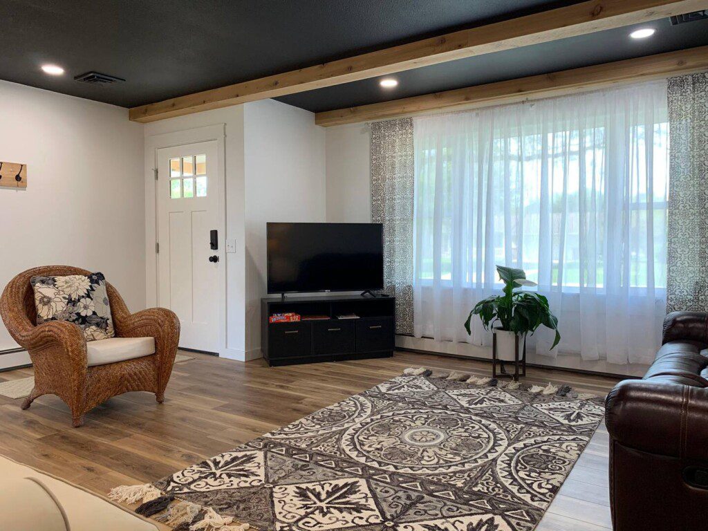 Living Room with 55" Roku TV with YouTube TV access (cable-like access).