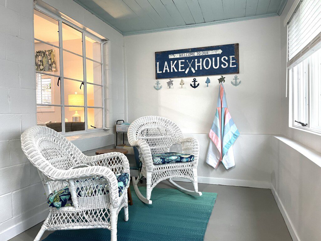 Stone Lake Cottage Retreat: Grab a seat, sip something warm, and soak in the lake view from the entry sitting room.