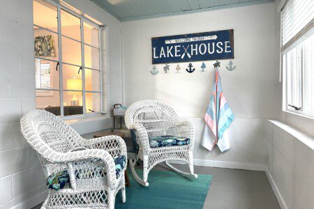 Stone Lake Cottage Retreat: Grab a seat, sip something warm, and soak in the lake view from the entry sitting room.
