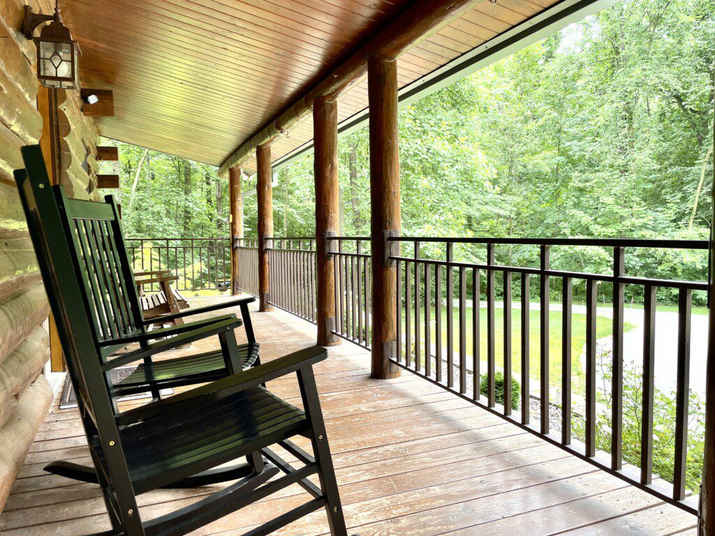 Trillium Lane Cabin - sit back and relax to enjoy nature all around you on the front porch in complete seclusion