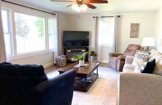 Living Room with 55" Samsung SmartTV with complimentary YouTubeTV access (sleeper sofa can sleep two people).