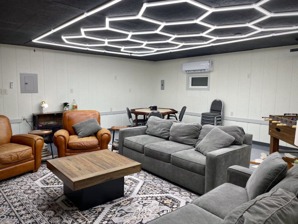The Waldron Lake Retreat Bonus Game Room: Unwind and have a blast! From foosball and poker nights to cozy movie marathons on the 55" Roku TV with YouTubeTV, we've got all the fun vibes covered—complete with awesome lighting and board games!