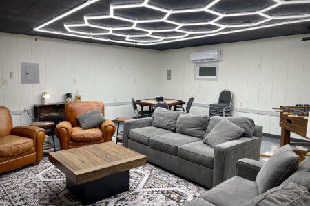 The Waldron Lake Retreat Bonus Game Room: Unwind and have a blast! From foosball and poker nights to cozy movie marathons on the 55" Roku TV with YouTubeTV, we've got all the fun vibes covered—complete with awesome lighting and board games!