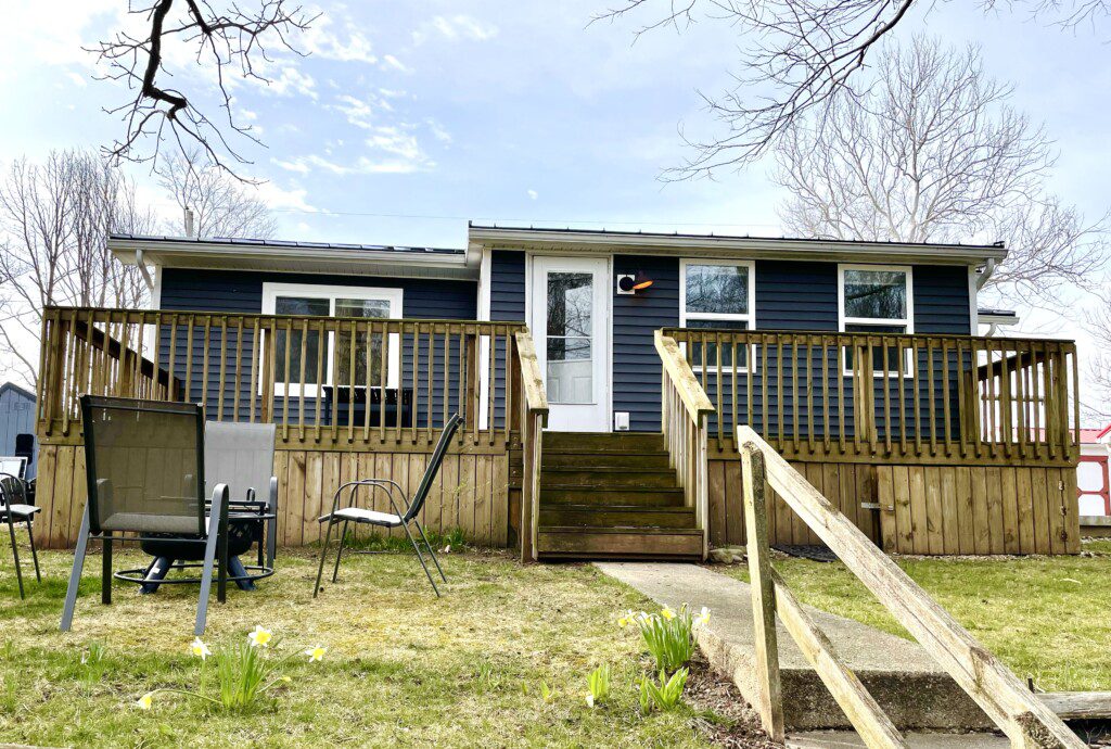 The Pigeon River Retreat: the view of the house from down by the river