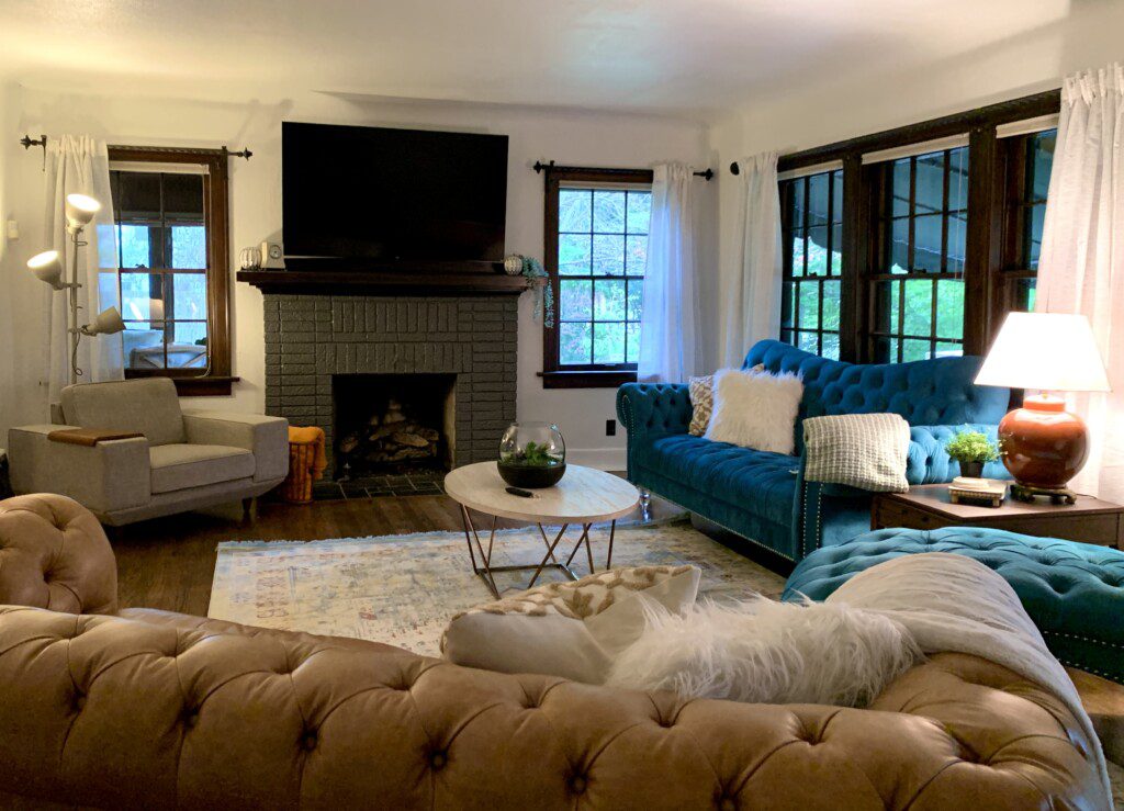 Living Room with 65" Roku TV with YouTube TV access provided. Enjoy the comfortable, unique, and retro sofa options